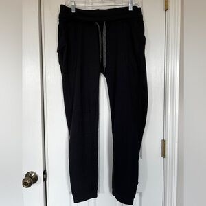 Lululemon sweatpants in black with charcoal drawstring.  Size 10.